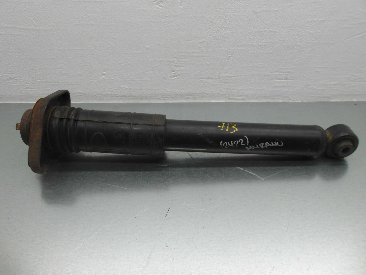 Амортизатор задний левый