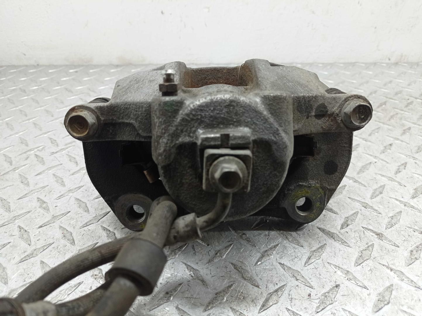 Суппорт передний левый