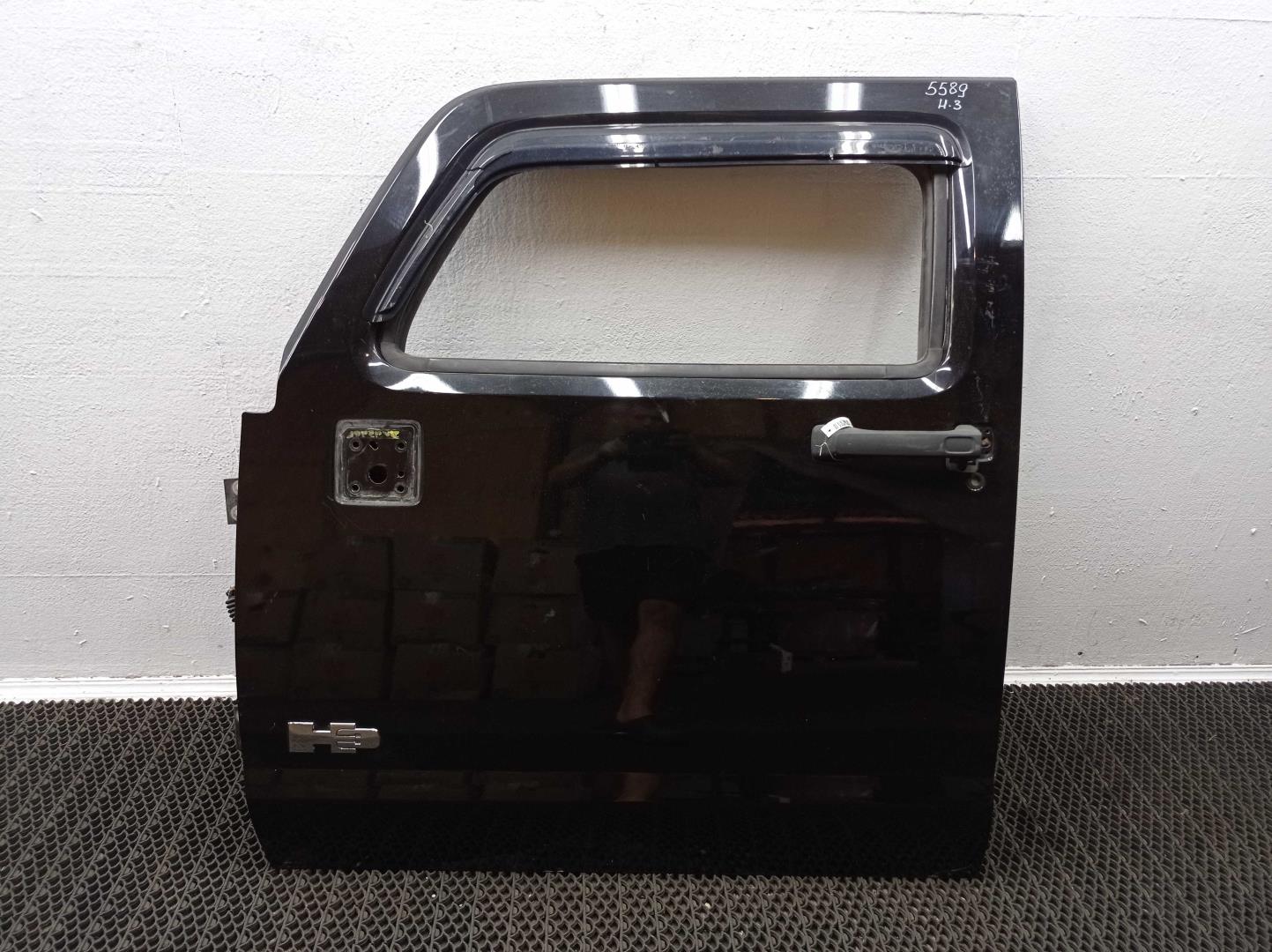 Ручка двери передней наружная левая