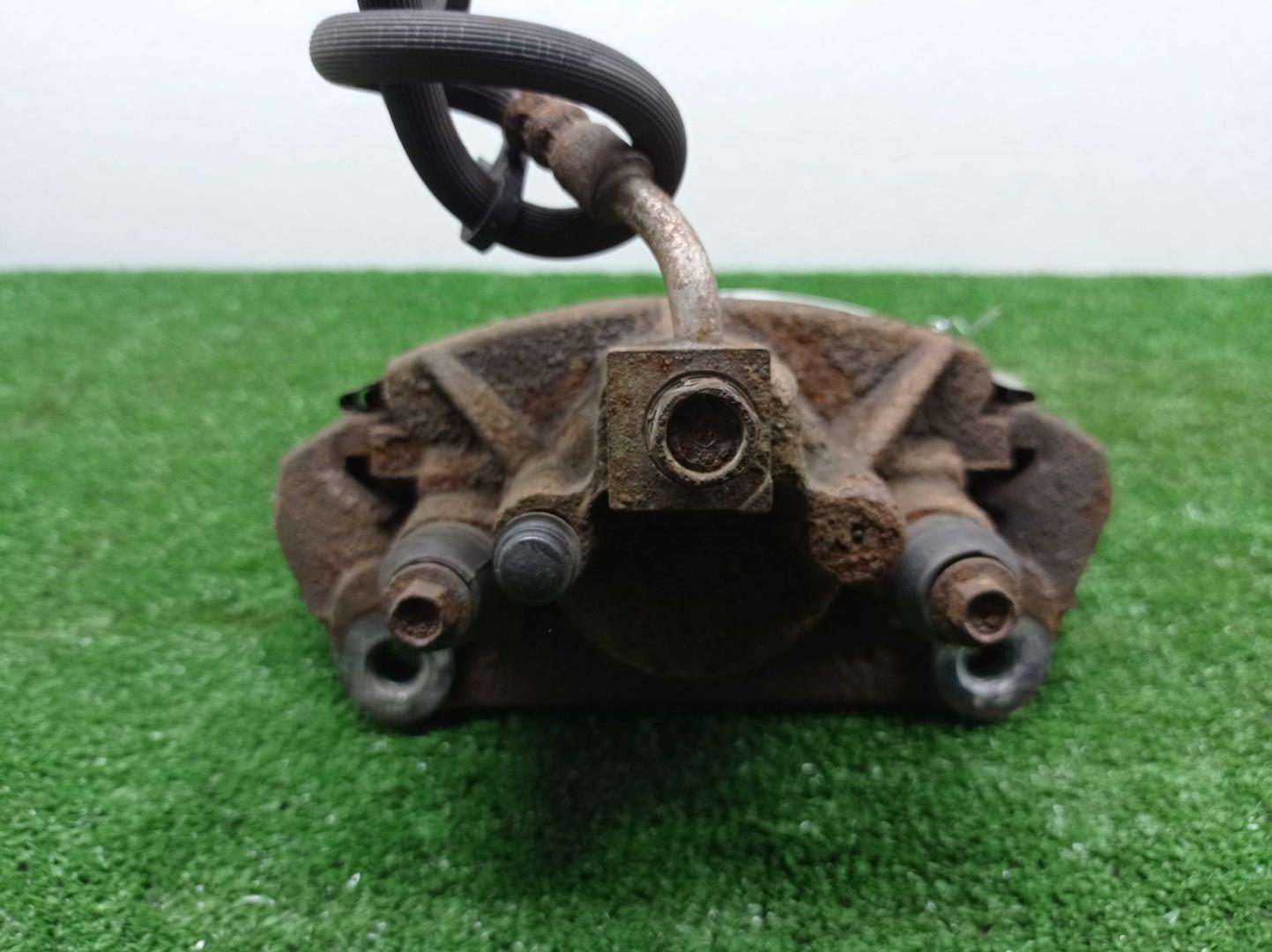 Суппорт задний левый