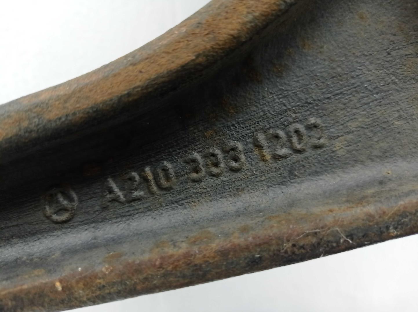 Рычаг передний нижний левый