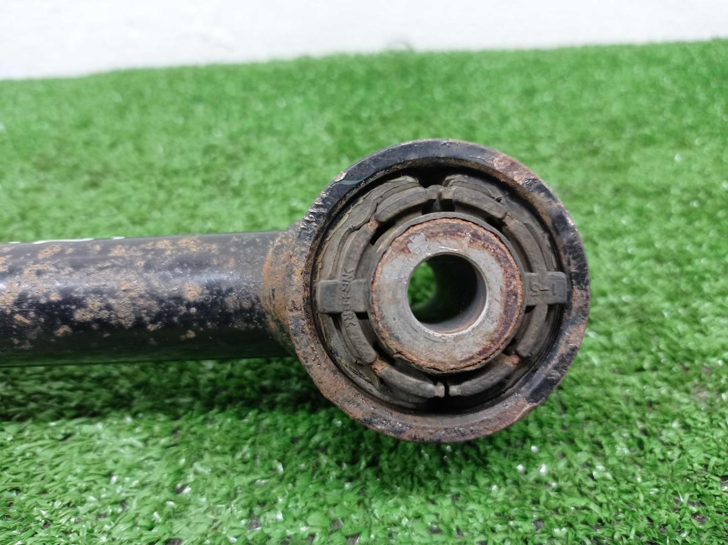 Рычаг задний левый