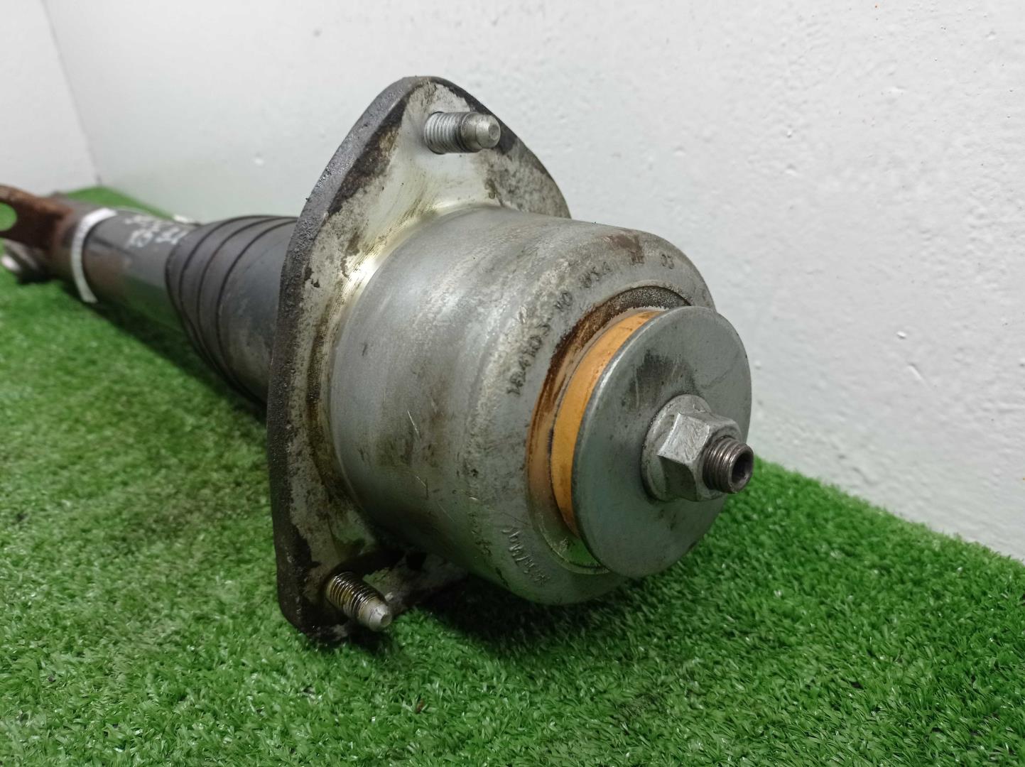 Амортизатор задний левый