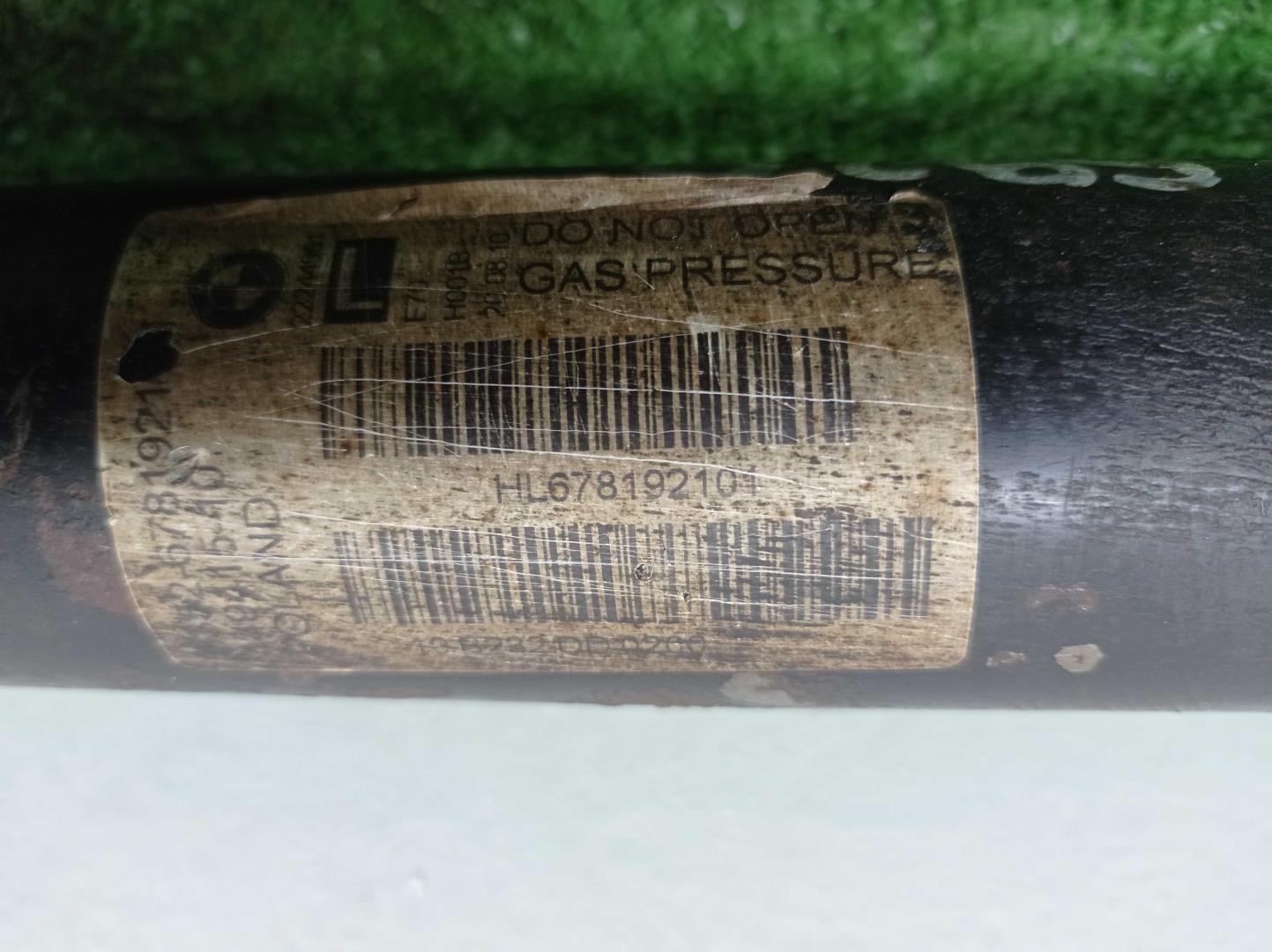 Амортизатор задний левый