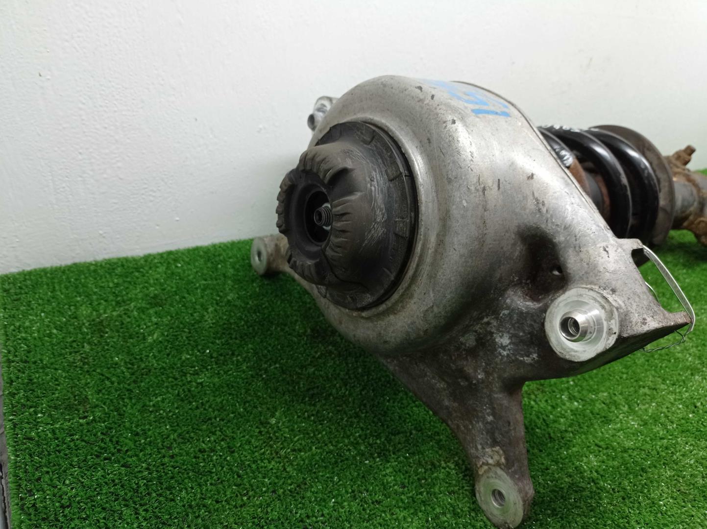 Амортизатор передний левый