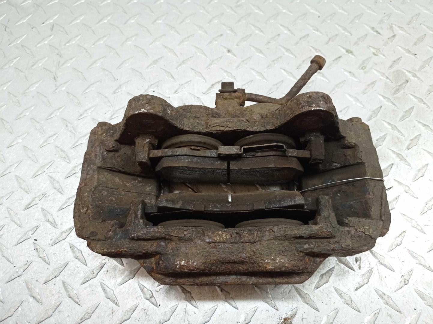 Суппорт передний левый