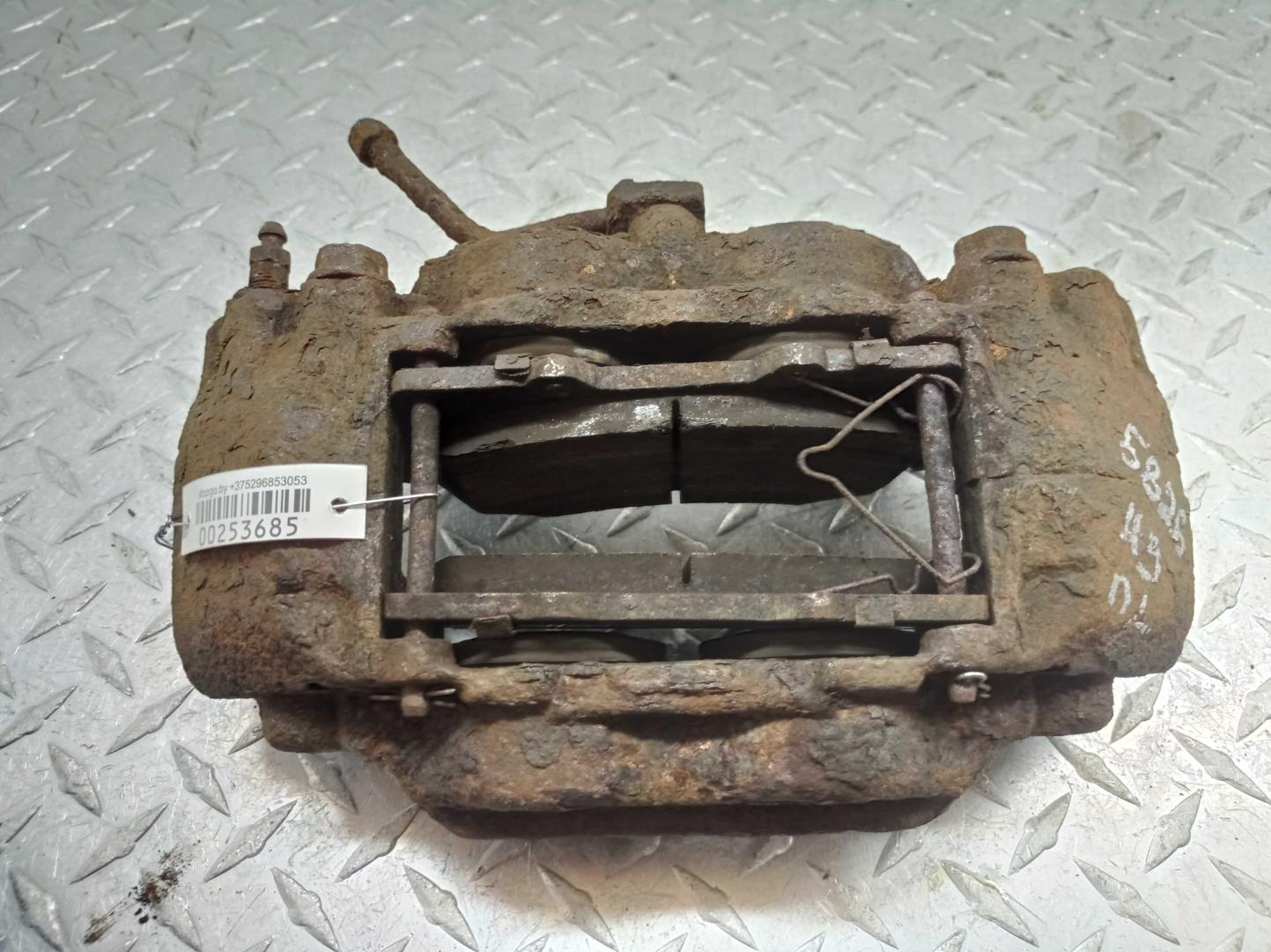 Суппорт передний левый