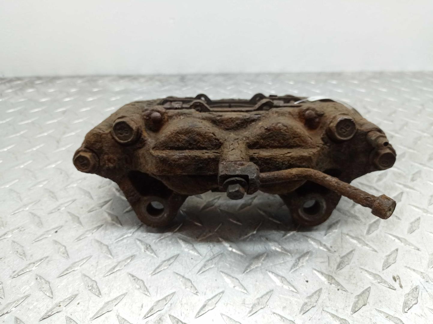 Суппорт передний левый