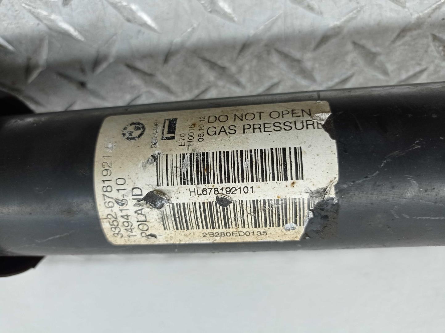 Амортизатор задний левый