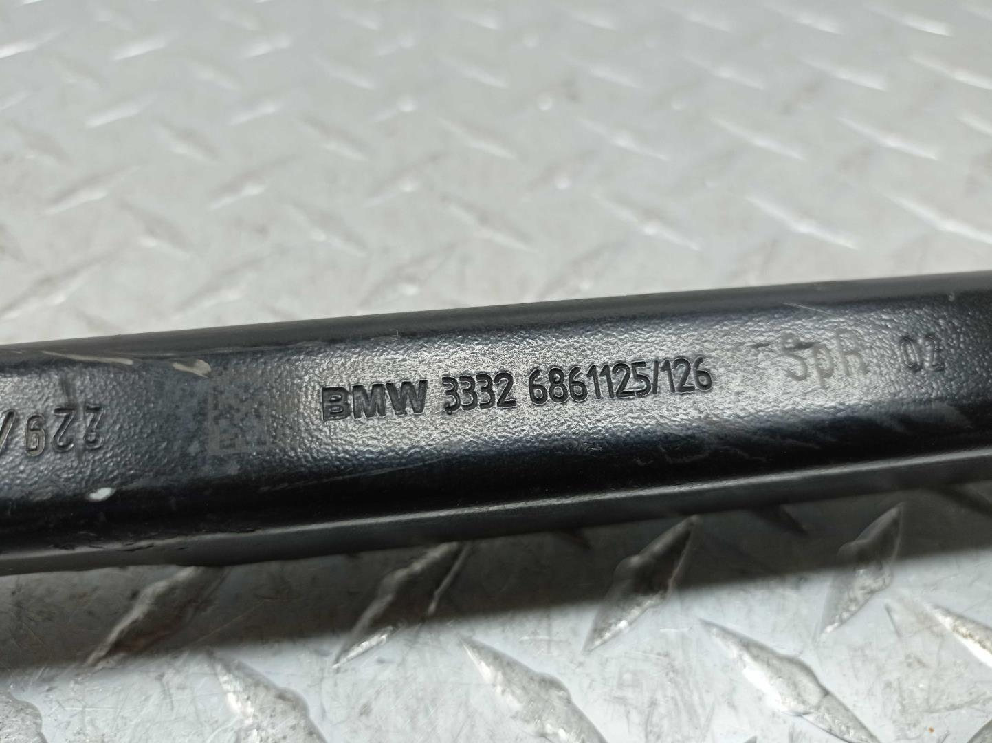 Рычаг задний левый