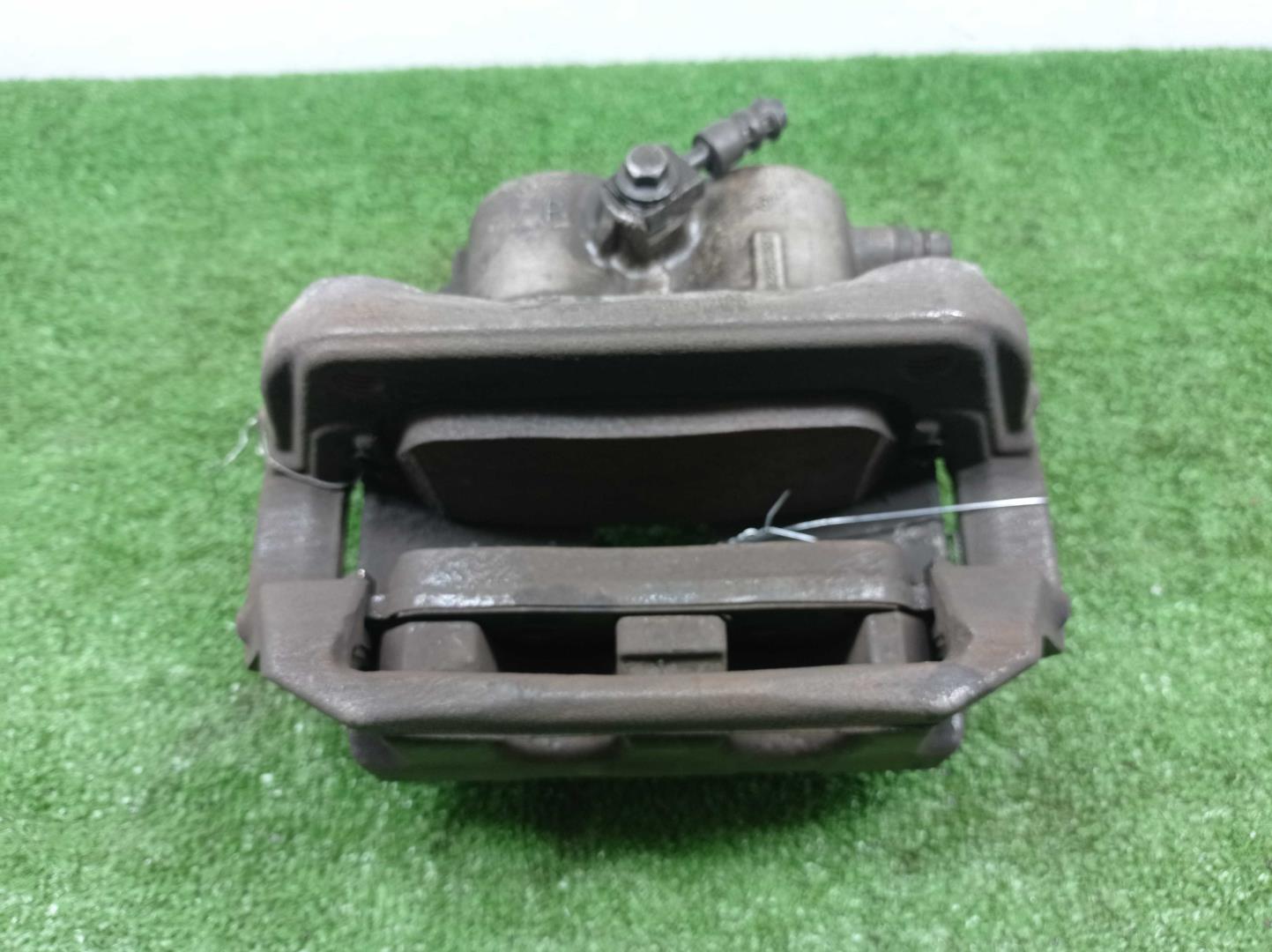 Суппорт передний левый