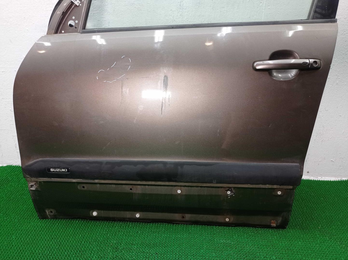 Стекло двери передней левой