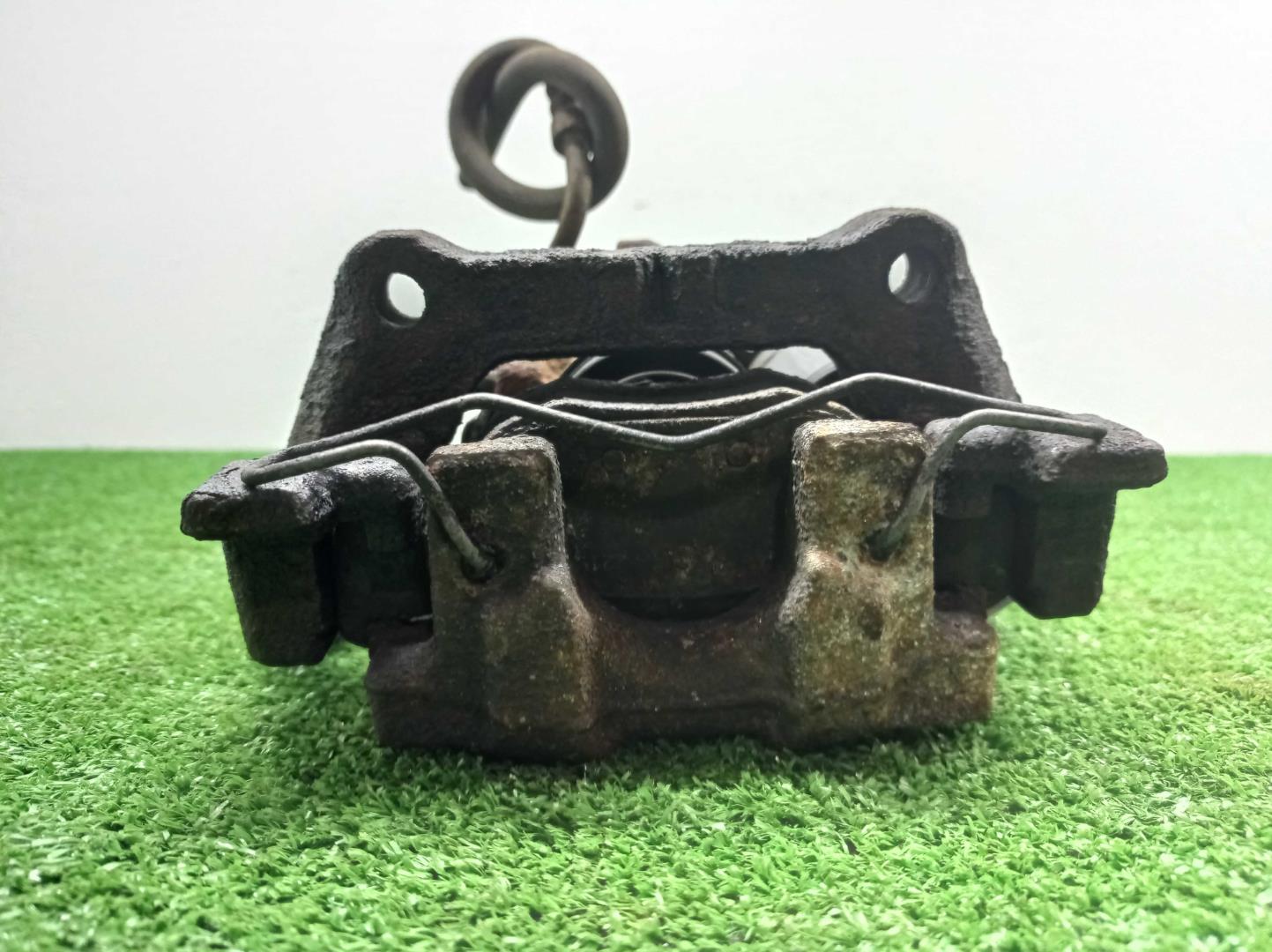 Суппорт задний левый