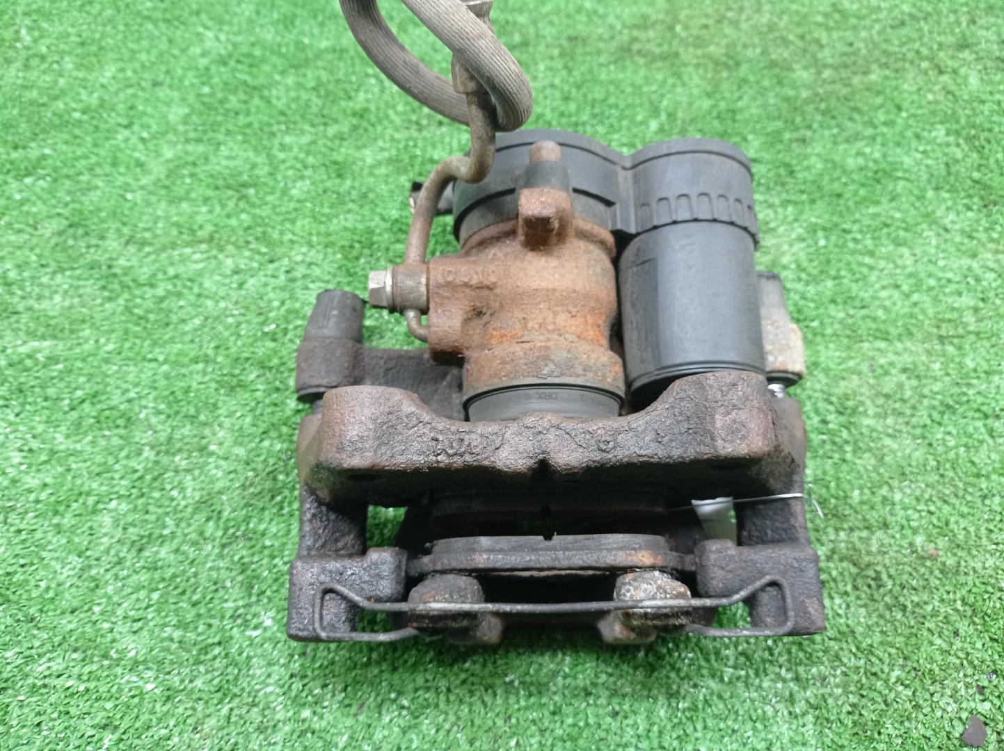 Суппорт задний левый