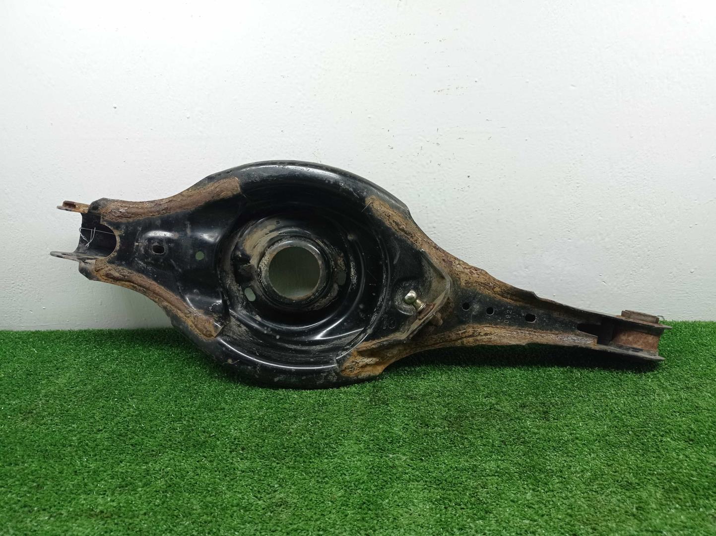 Рычаг задний нижний левый