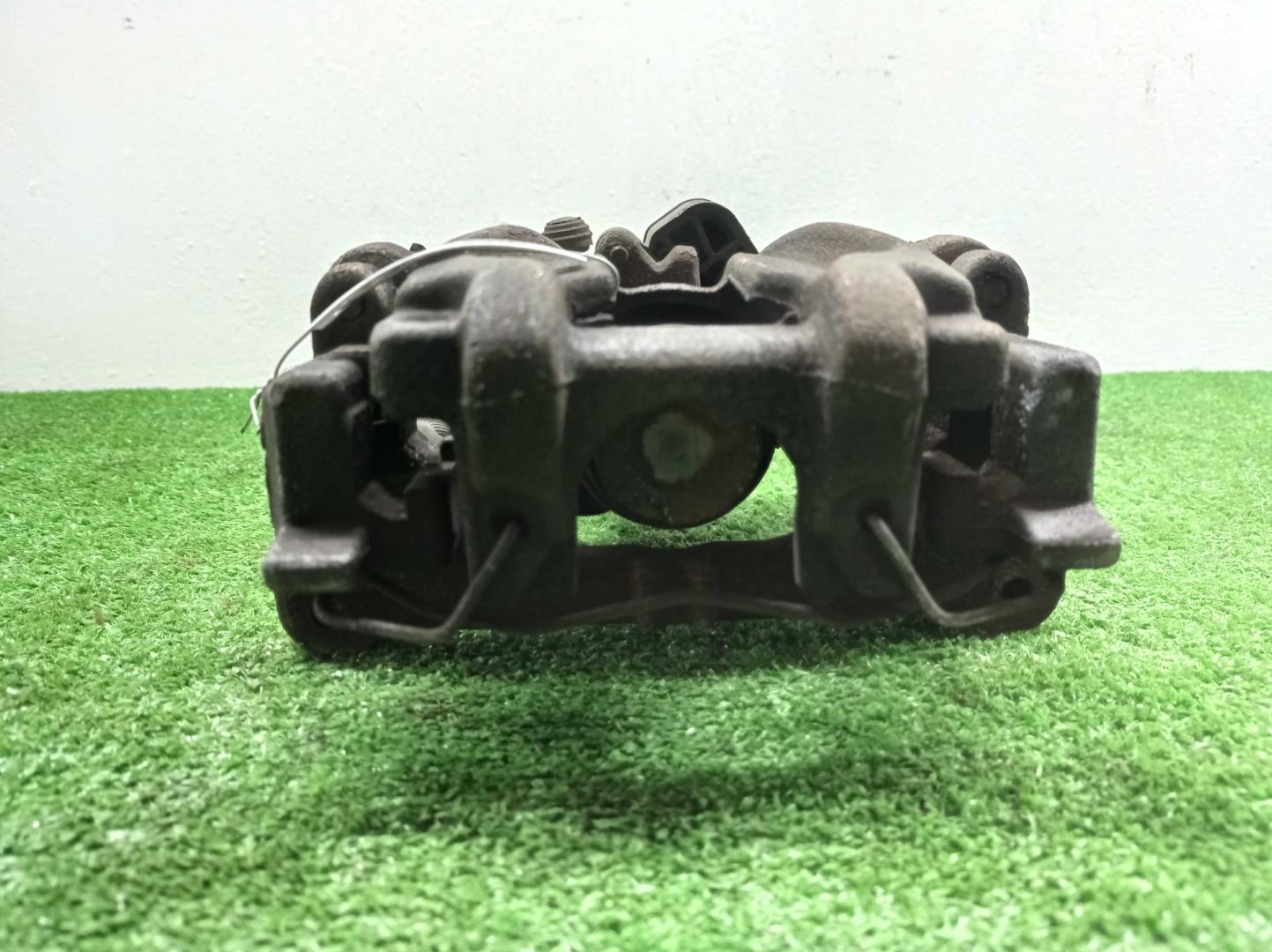 Суппорт задний левый