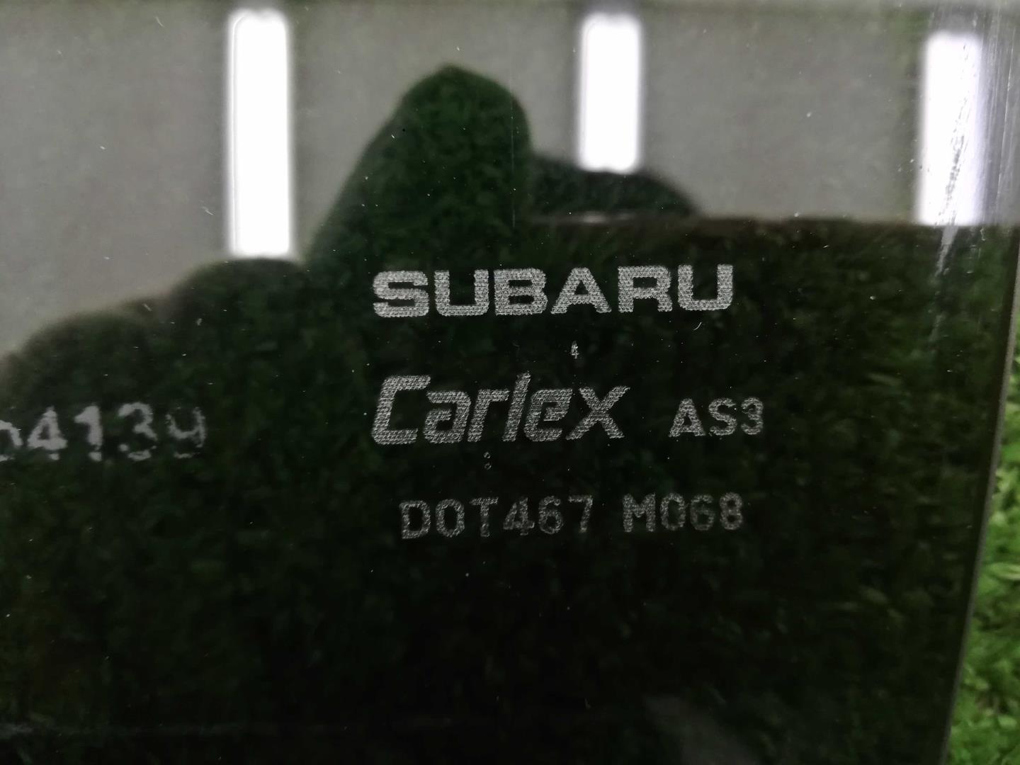 Стекло двери задней левой