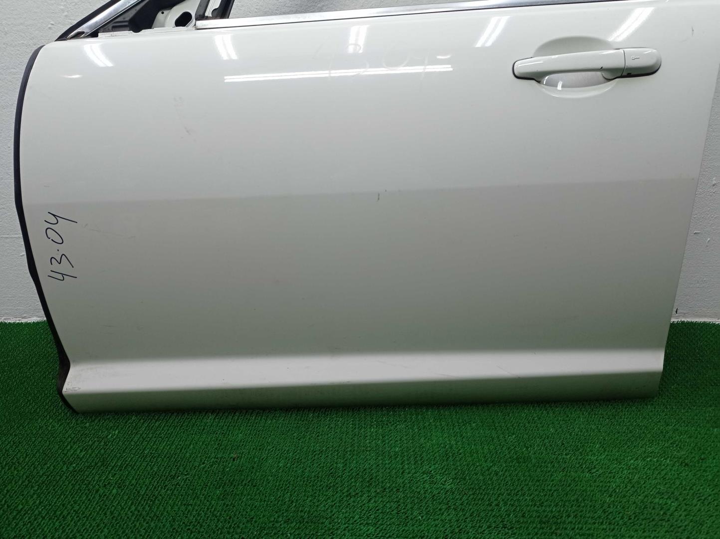 Стекло двери передней левой