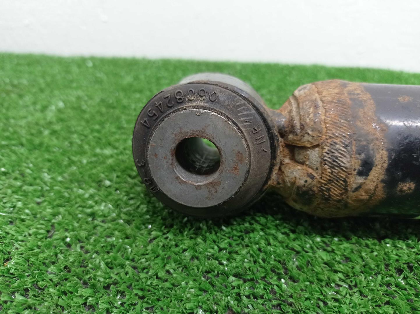 Амортизатор задний правый