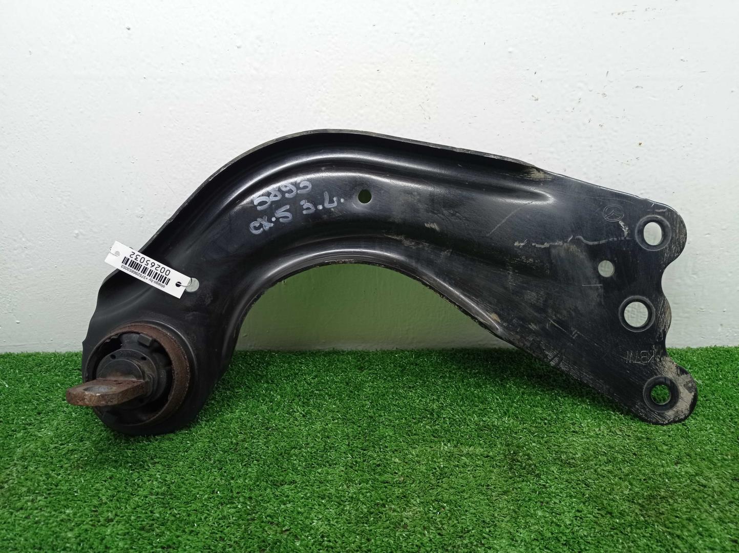 Рычаг задний левый