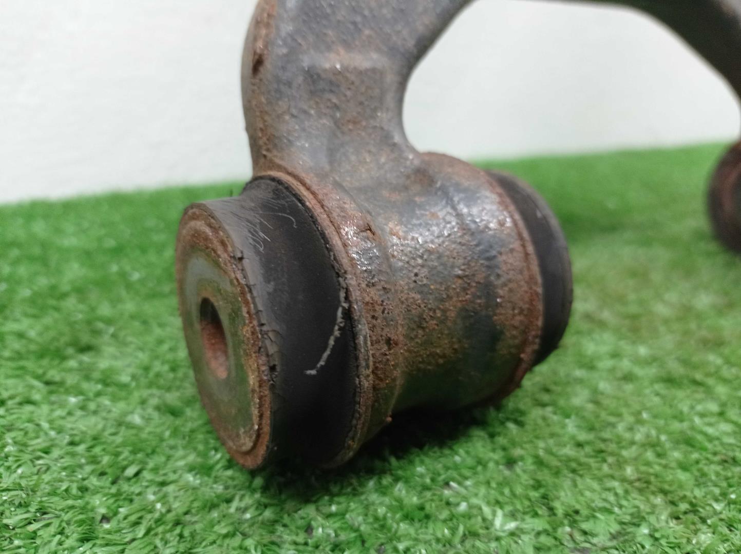 Рычаг задний левый