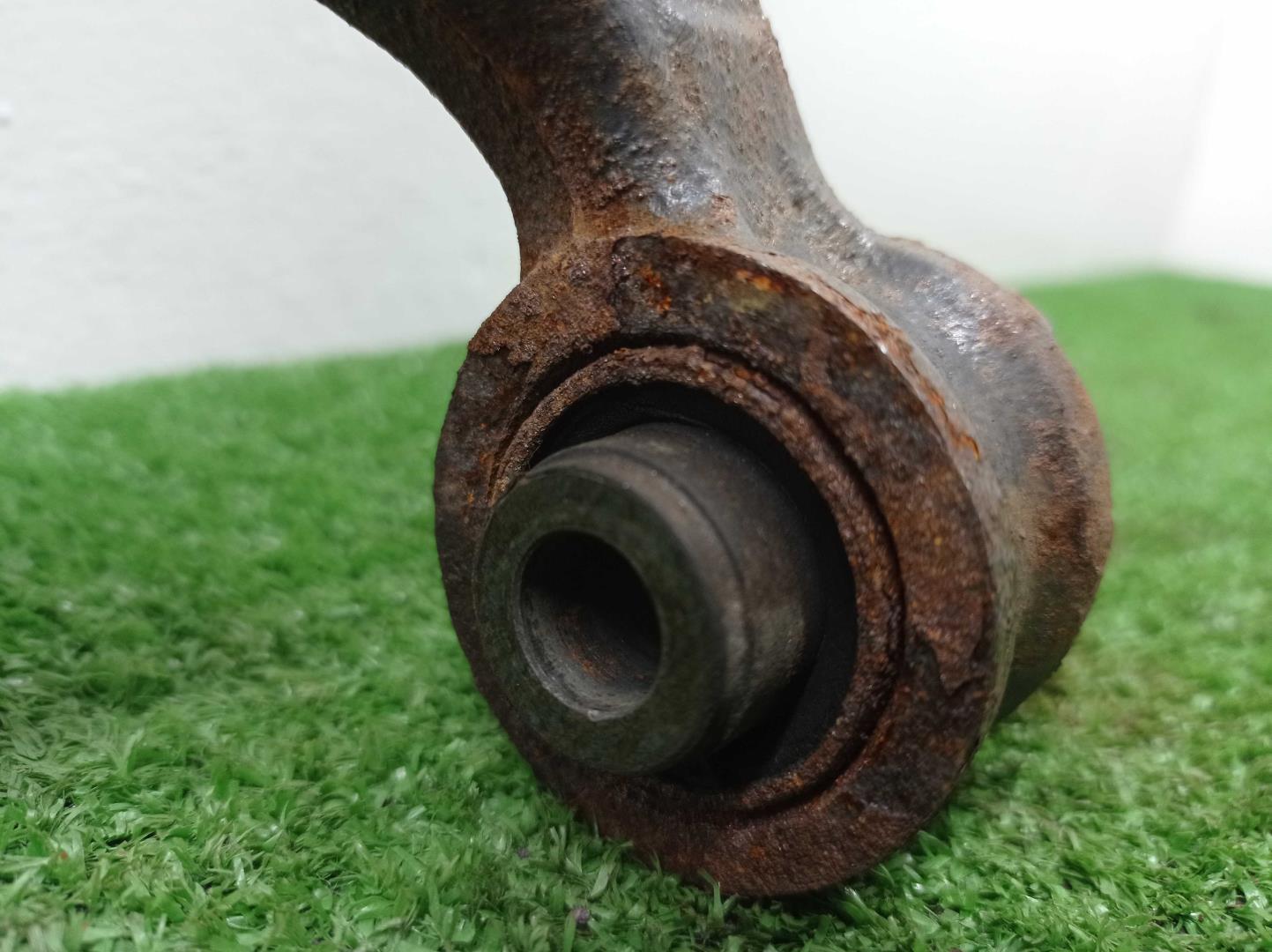 Рычаг задний левый