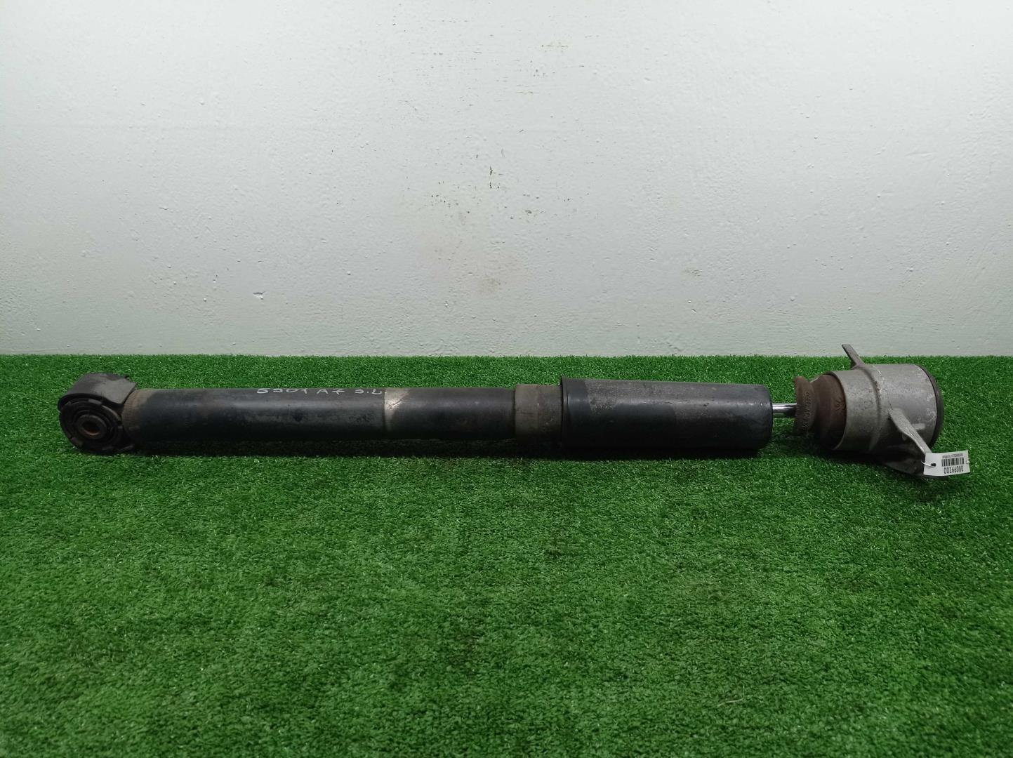 Амортизатор задний левый