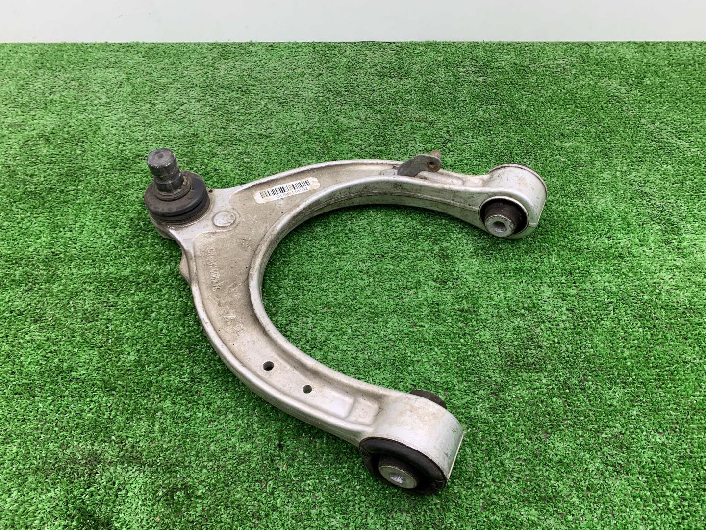 Рычаг передний верхний левый