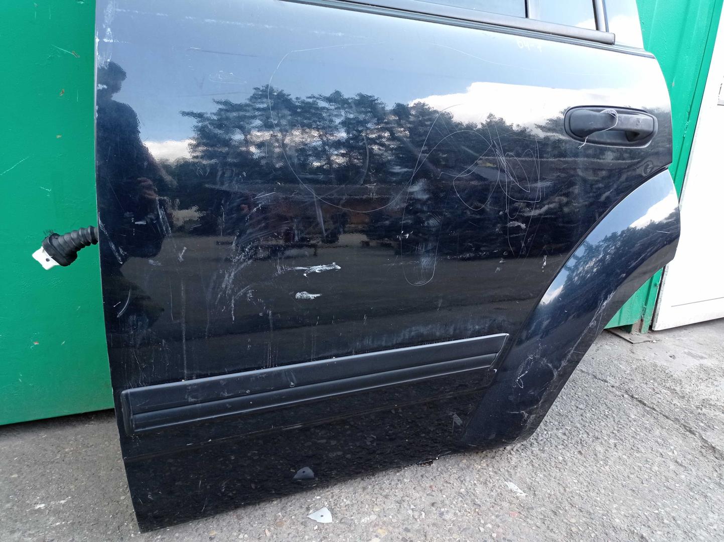 Стекло двери задней левой