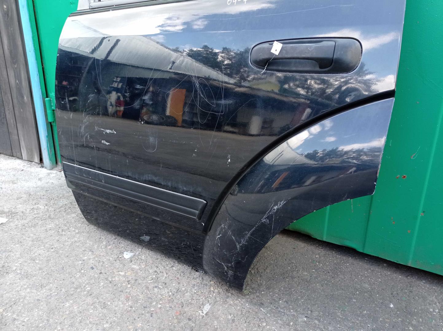 Стекло двери задней левой