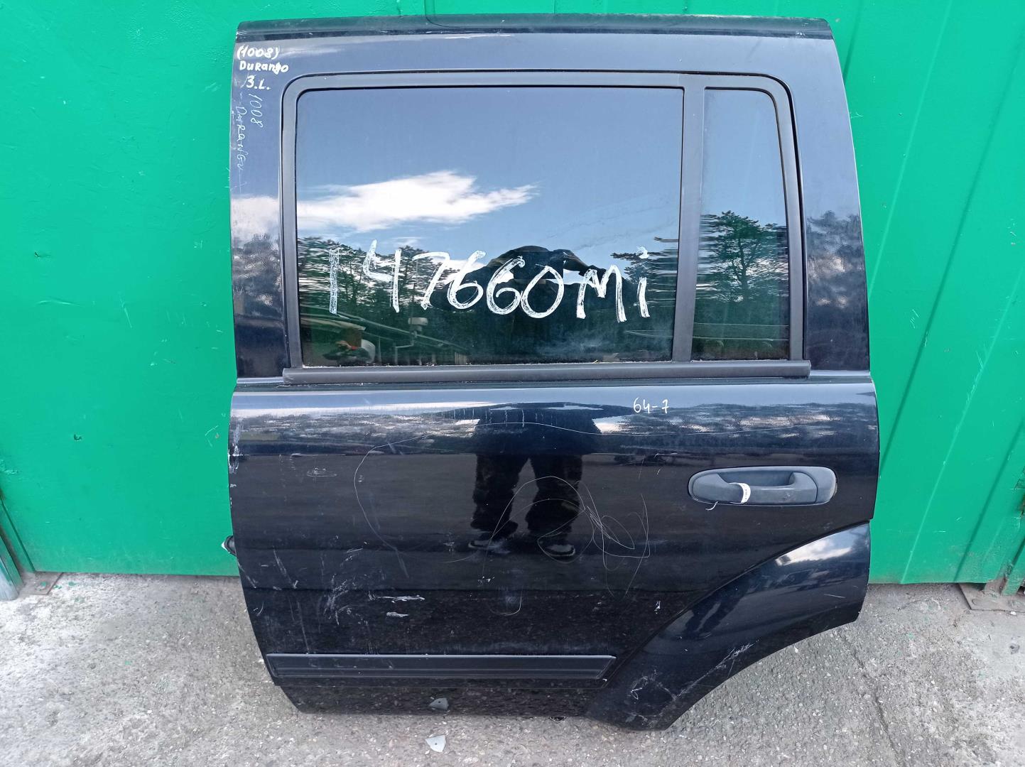 Стекло двери задней левой