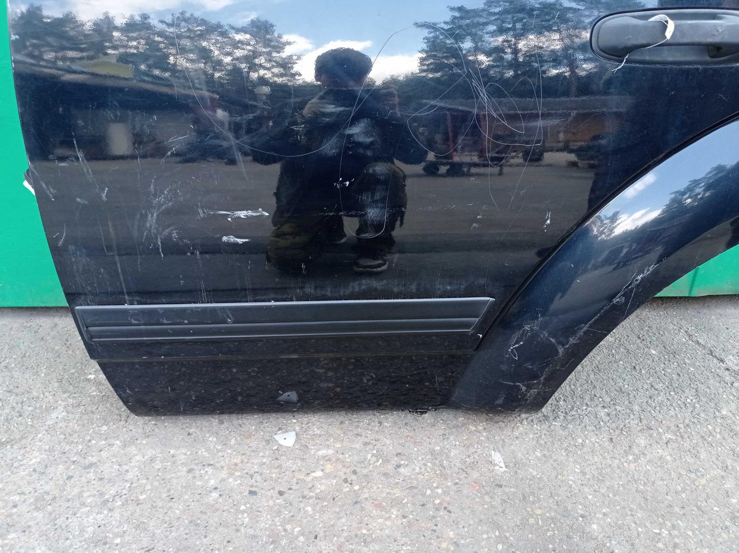 Стекло двери задней левой