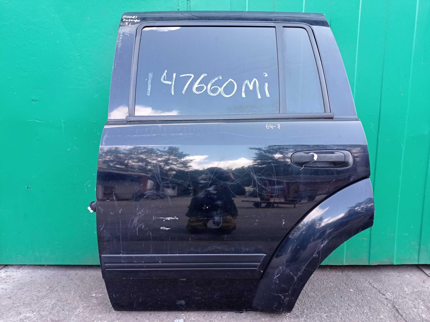 Стекло двери задней левой