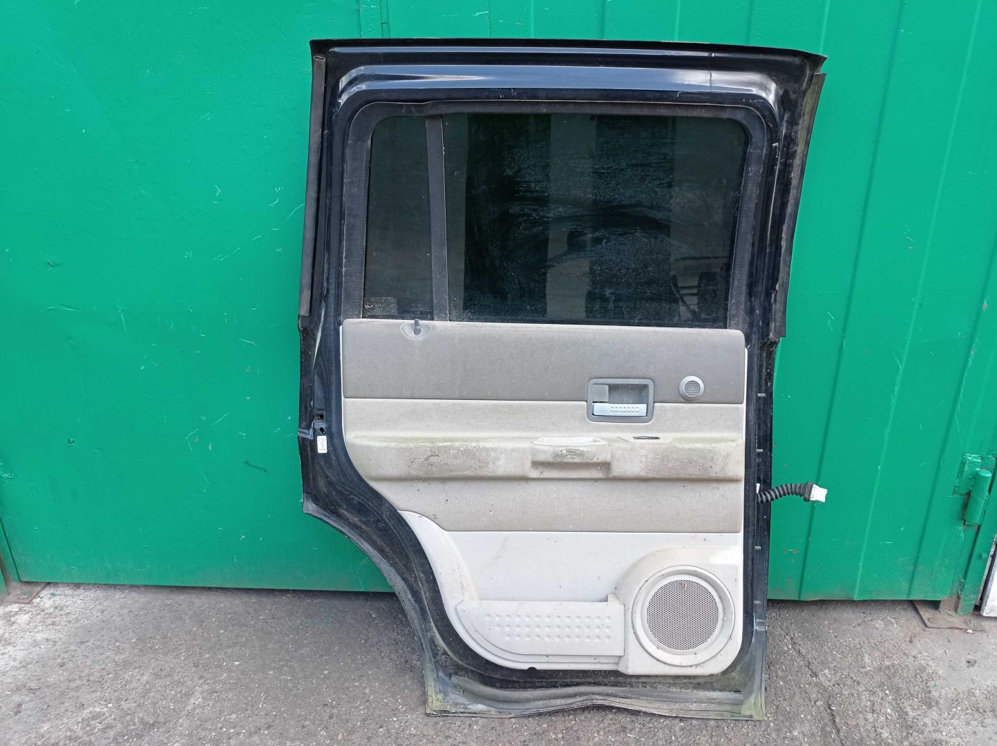 Стекло двери задней левой