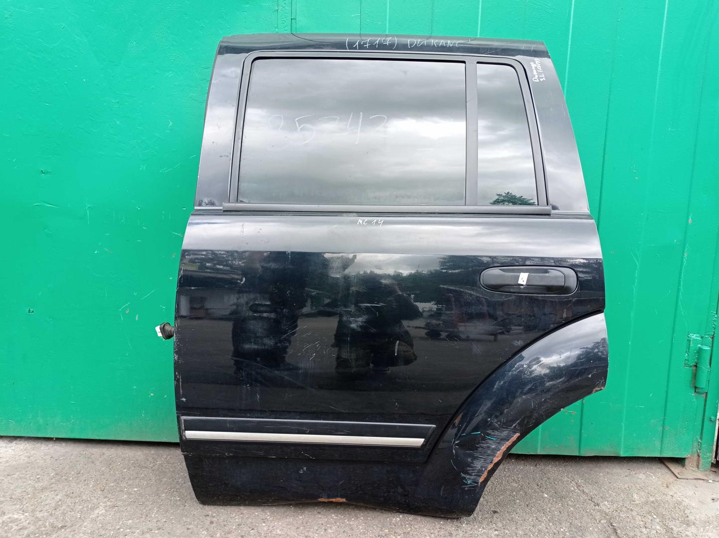 Стекло двери задней левой