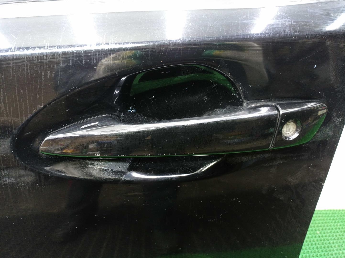 Ручка двери передней наружная левая