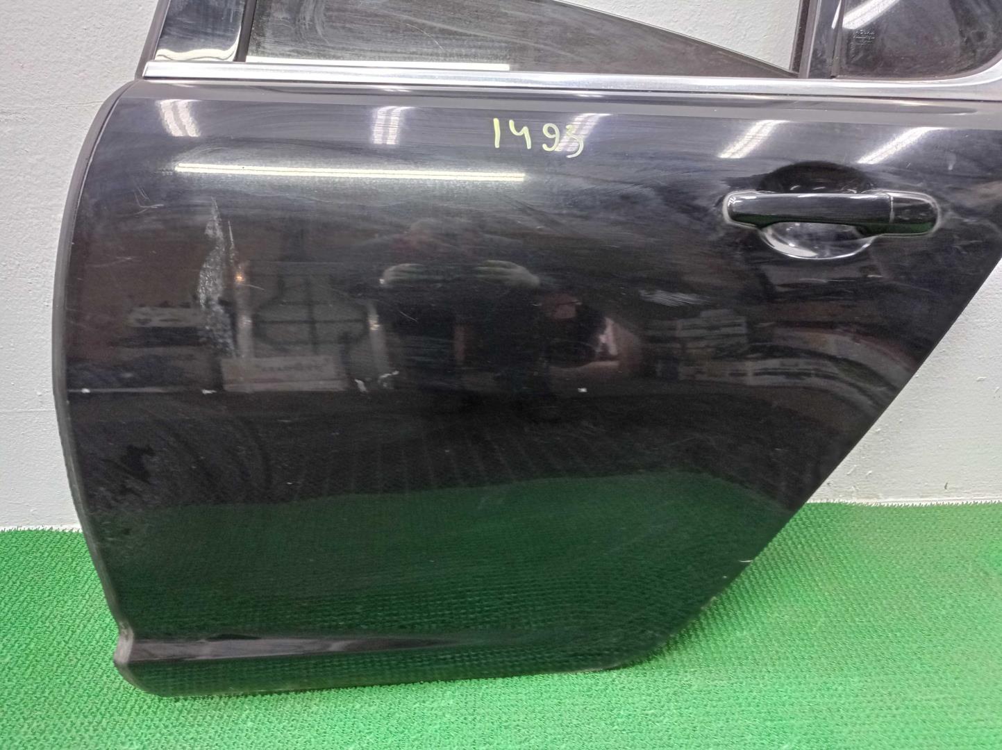 Стекло двери задней левой