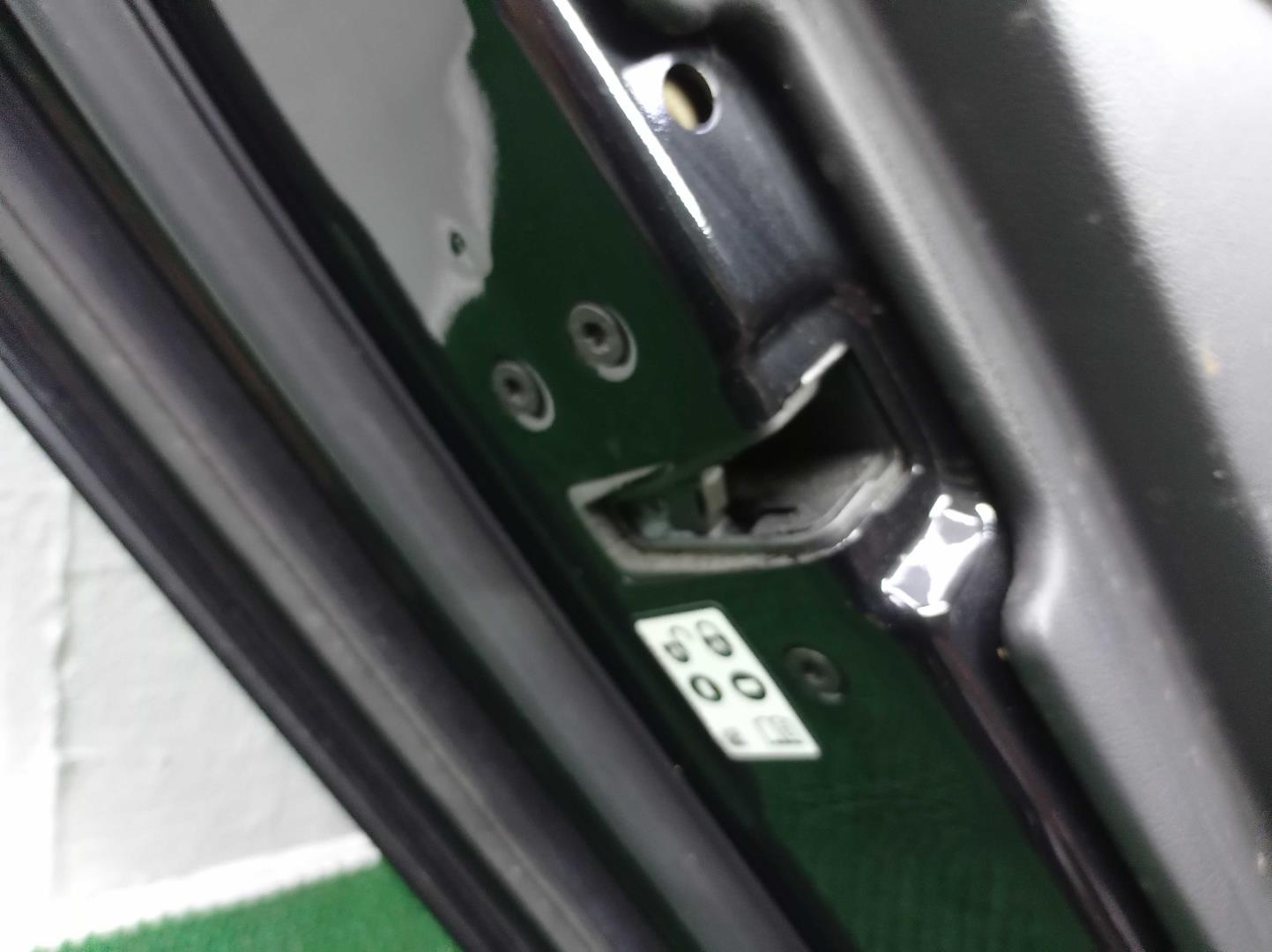 Стекло двери задней левой