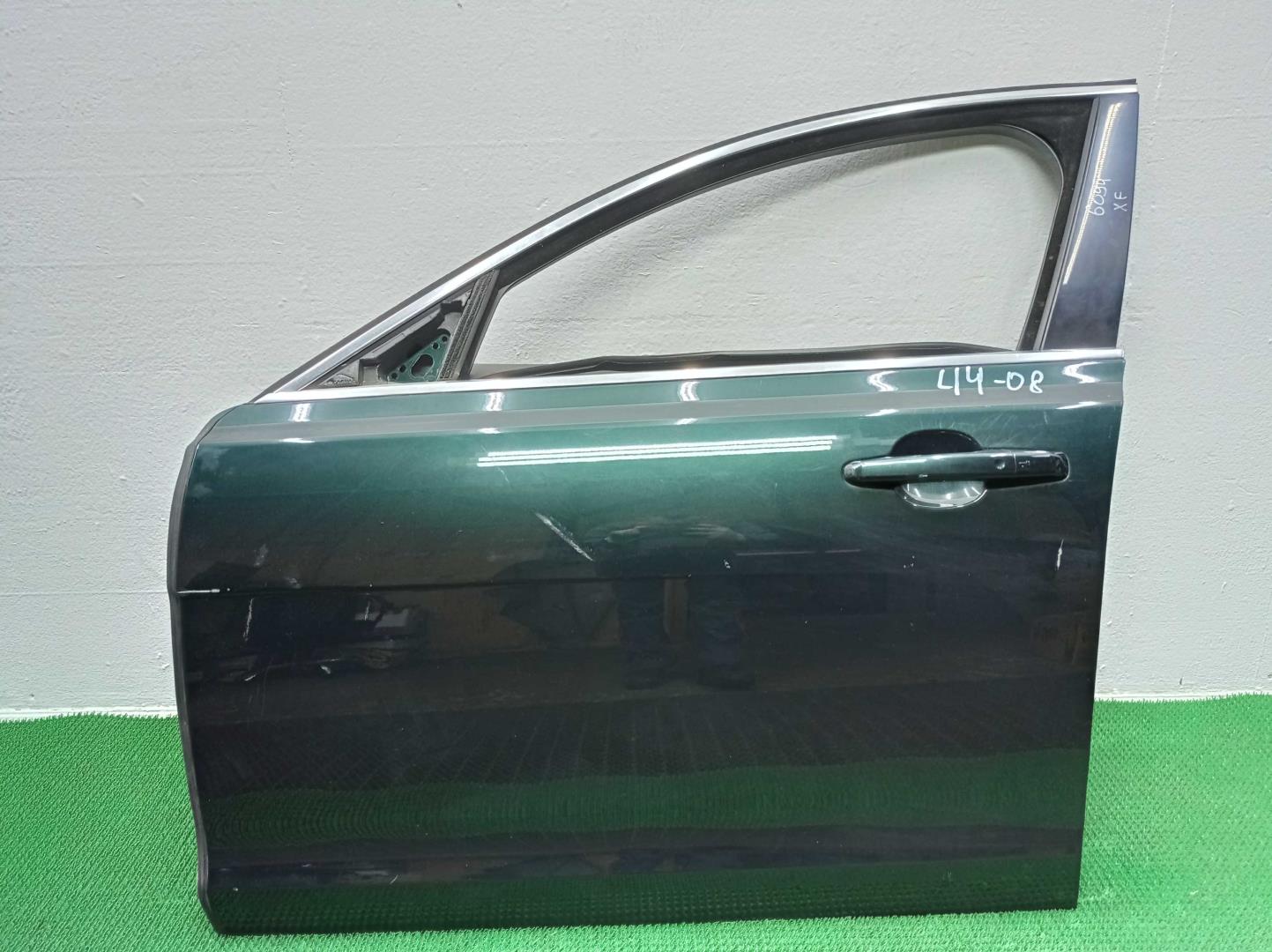 Ручка двери передней наружная левая