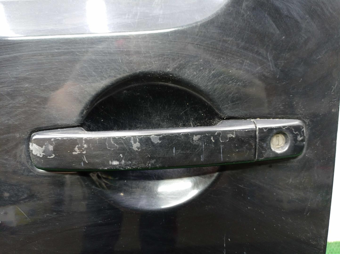 Стекло двери передней левой