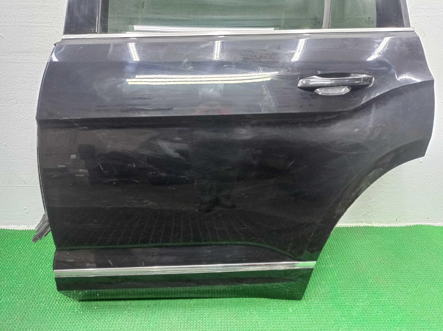 Замок двери задней левой