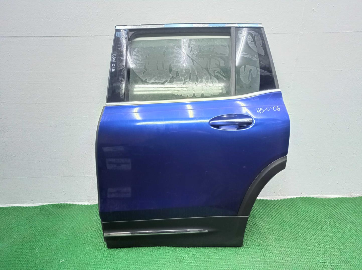 Стекло двери задней левой