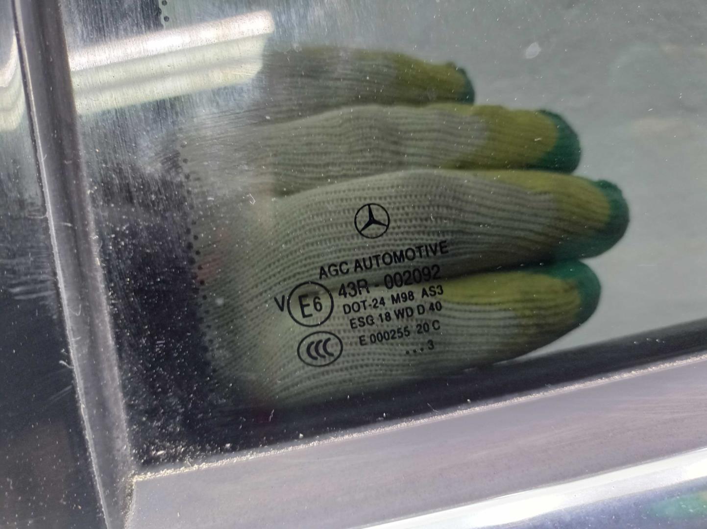 Стекло двери задней левой