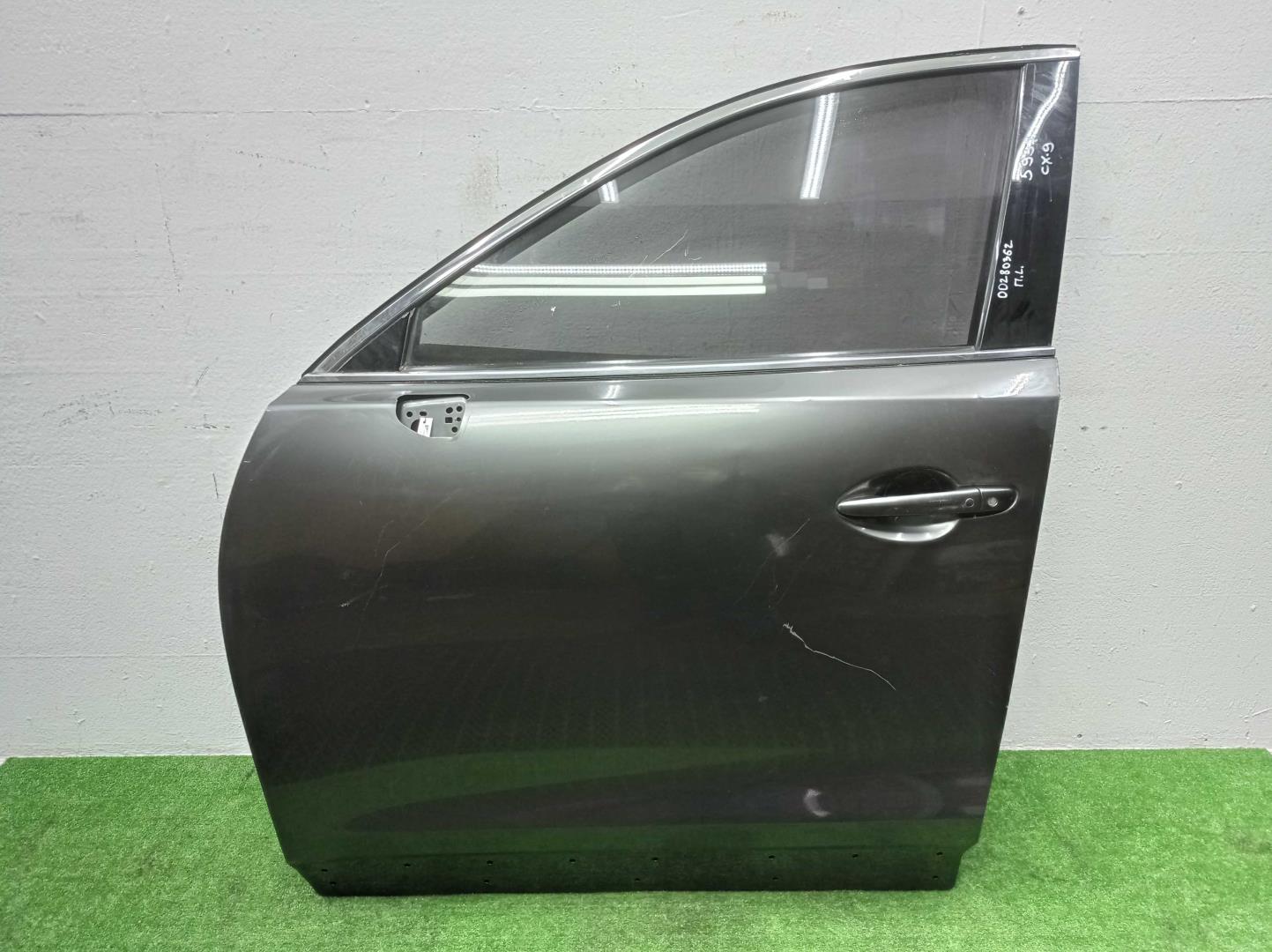 Замок двери передней левой