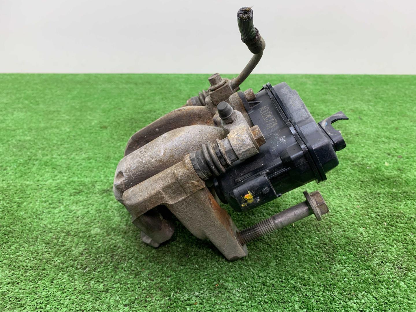 Суппорт задний левый