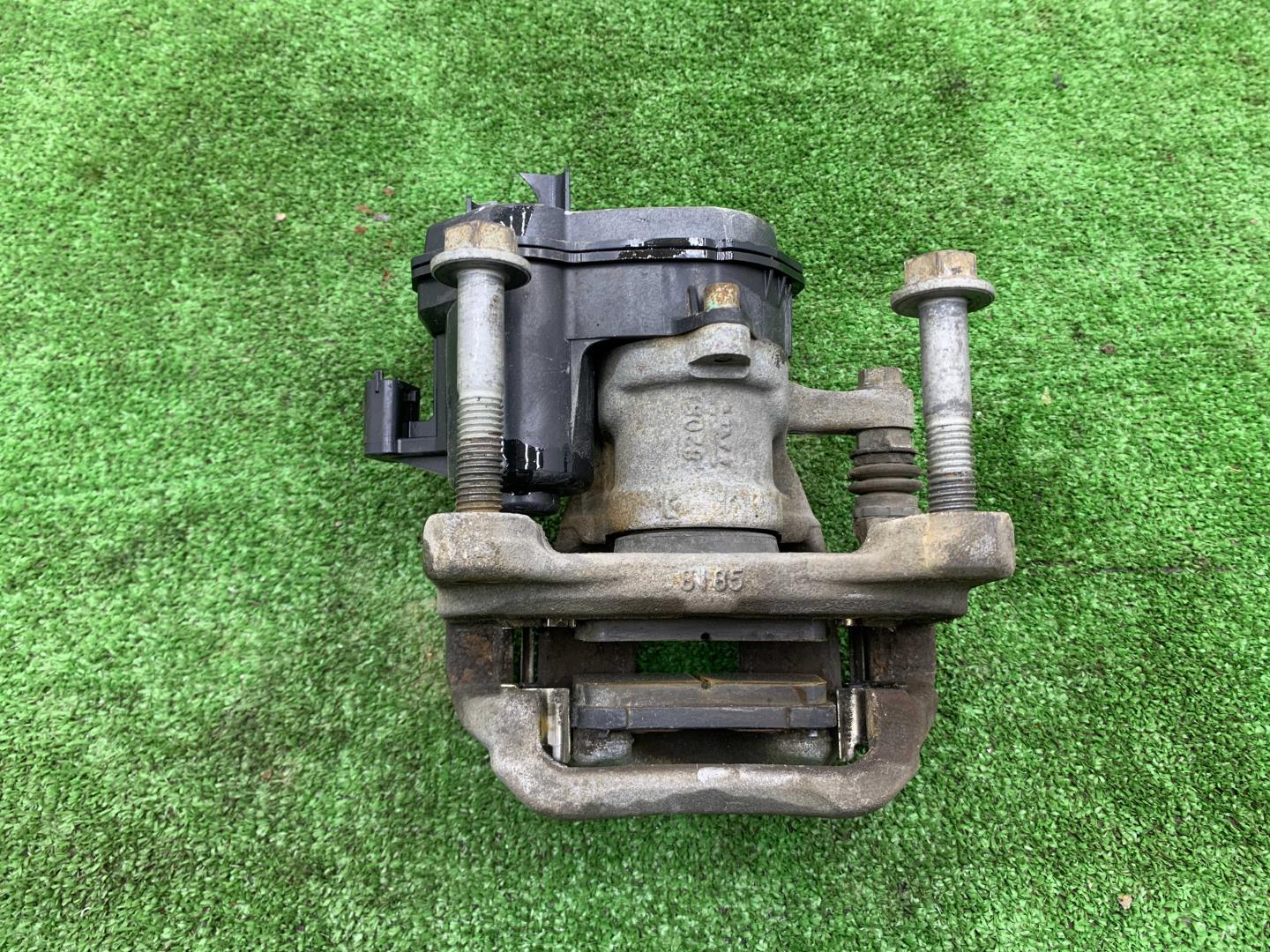 Суппорт задний левый