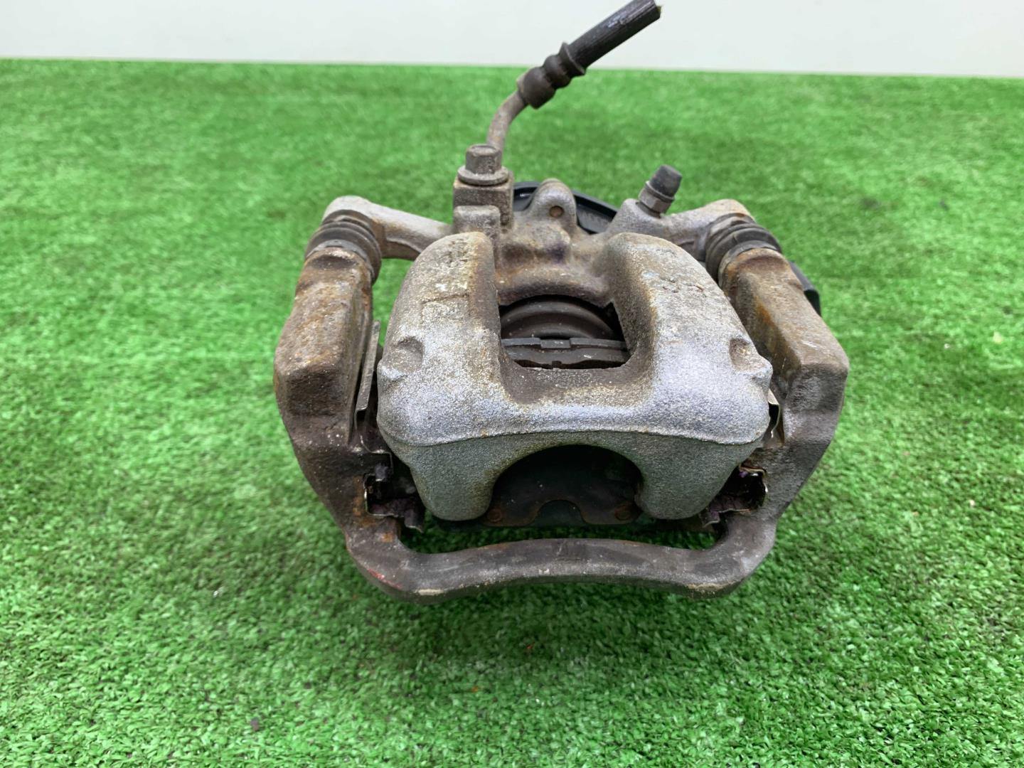 Суппорт задний левый