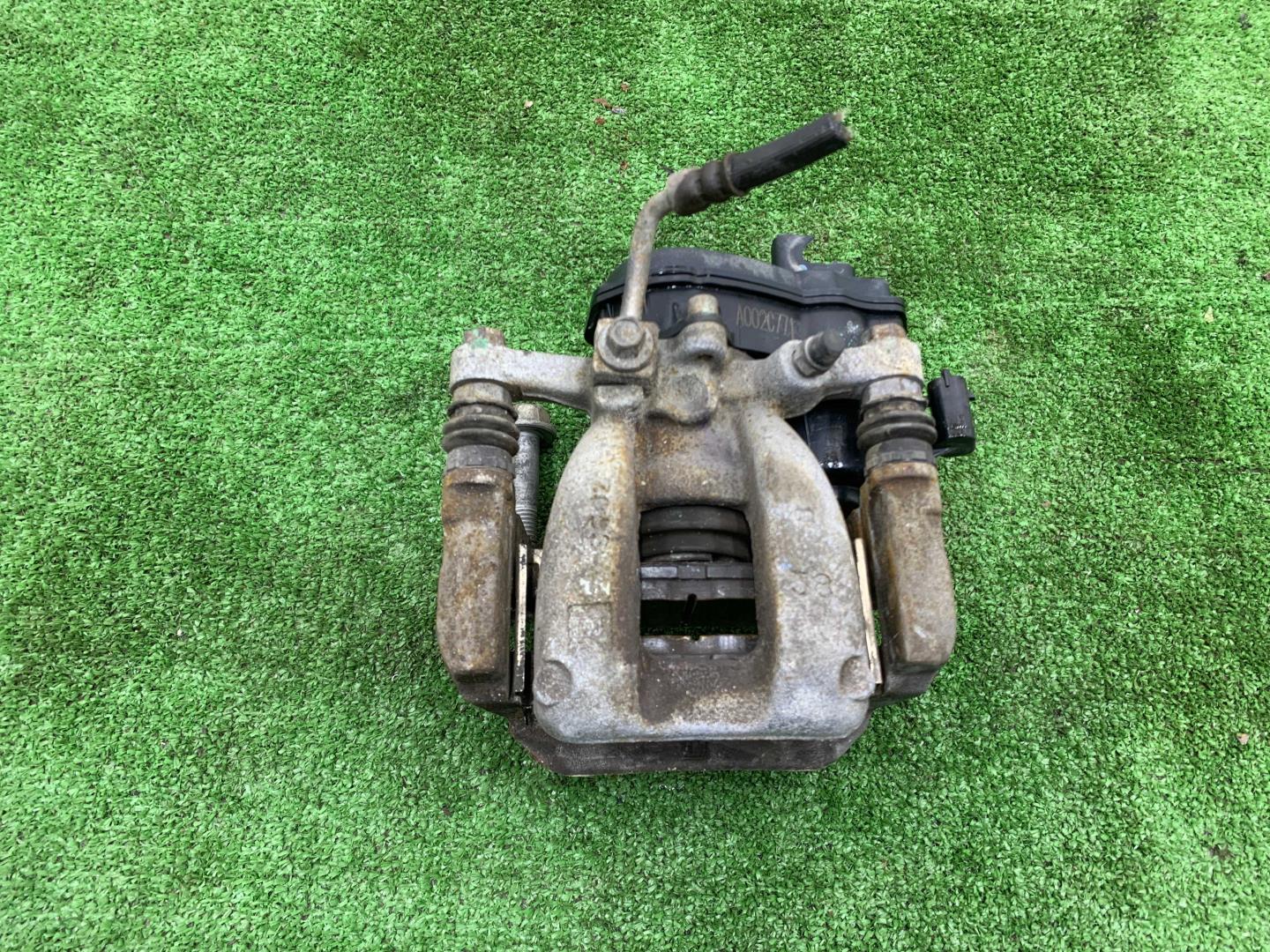 Суппорт задний левый