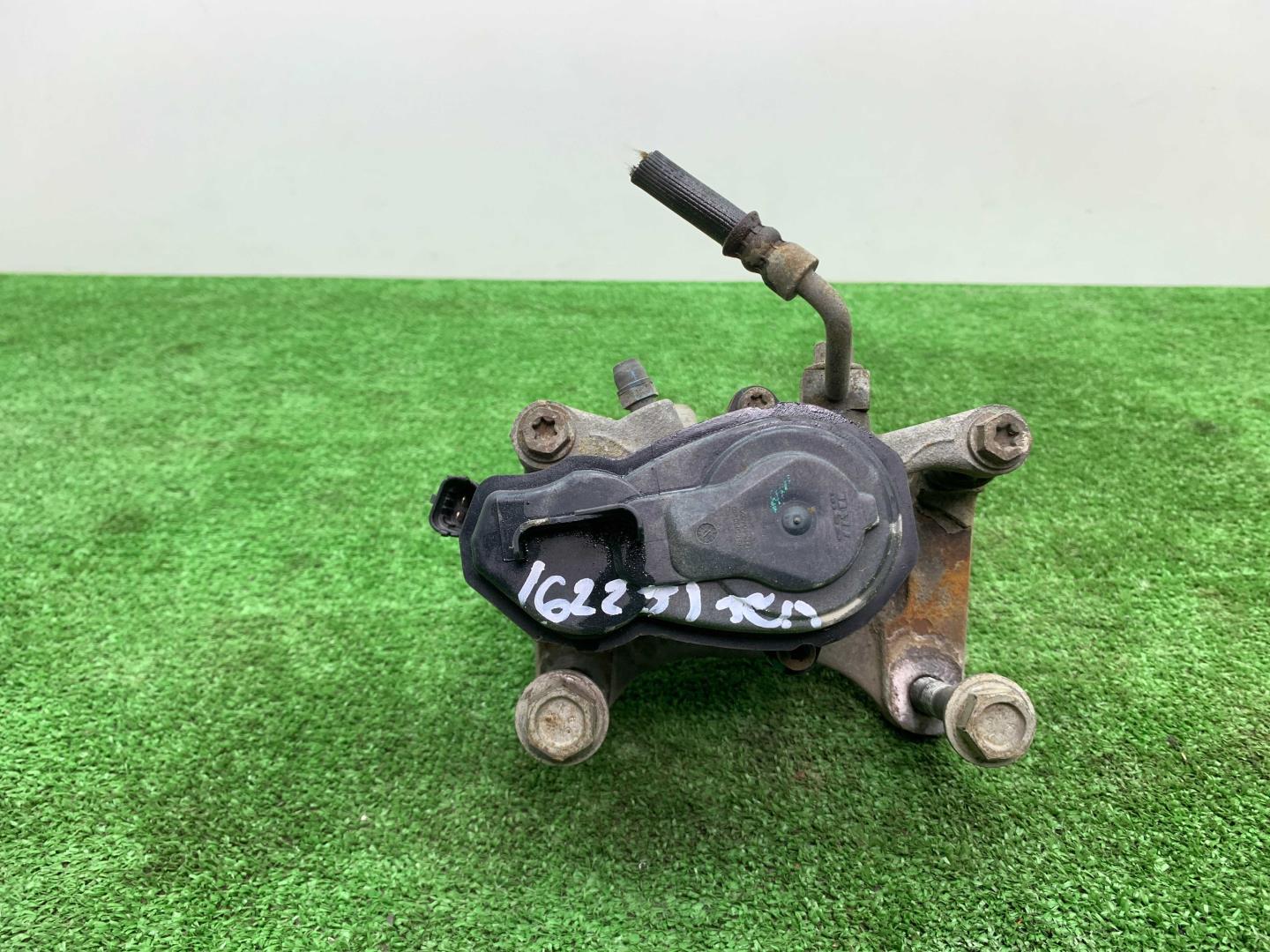 Суппорт задний левый