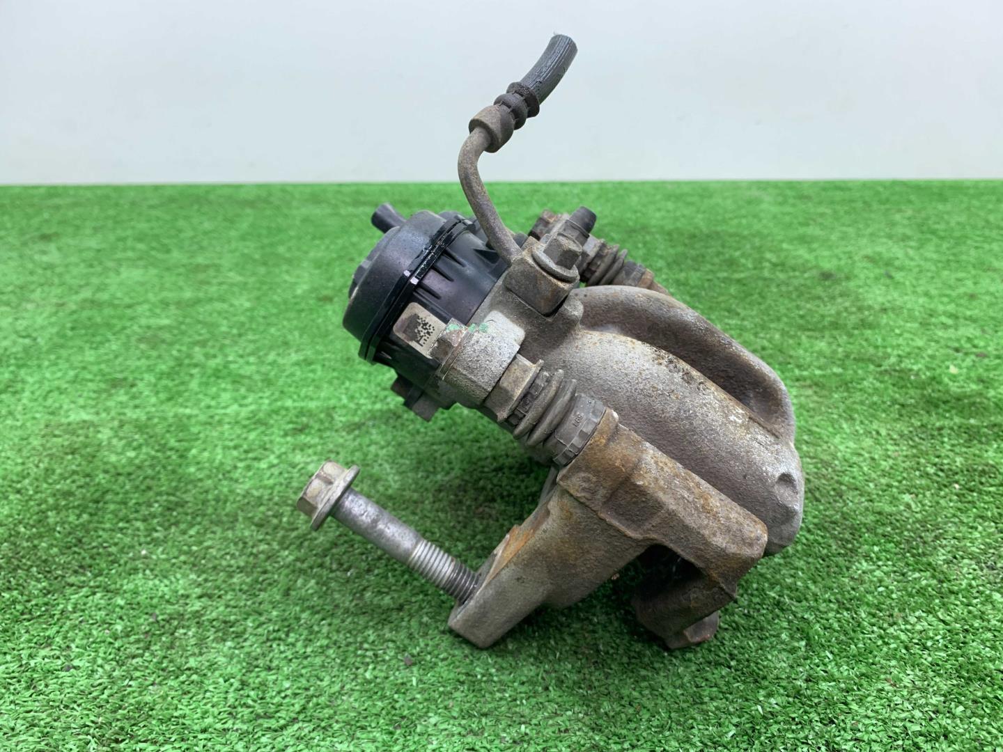 Суппорт задний левый